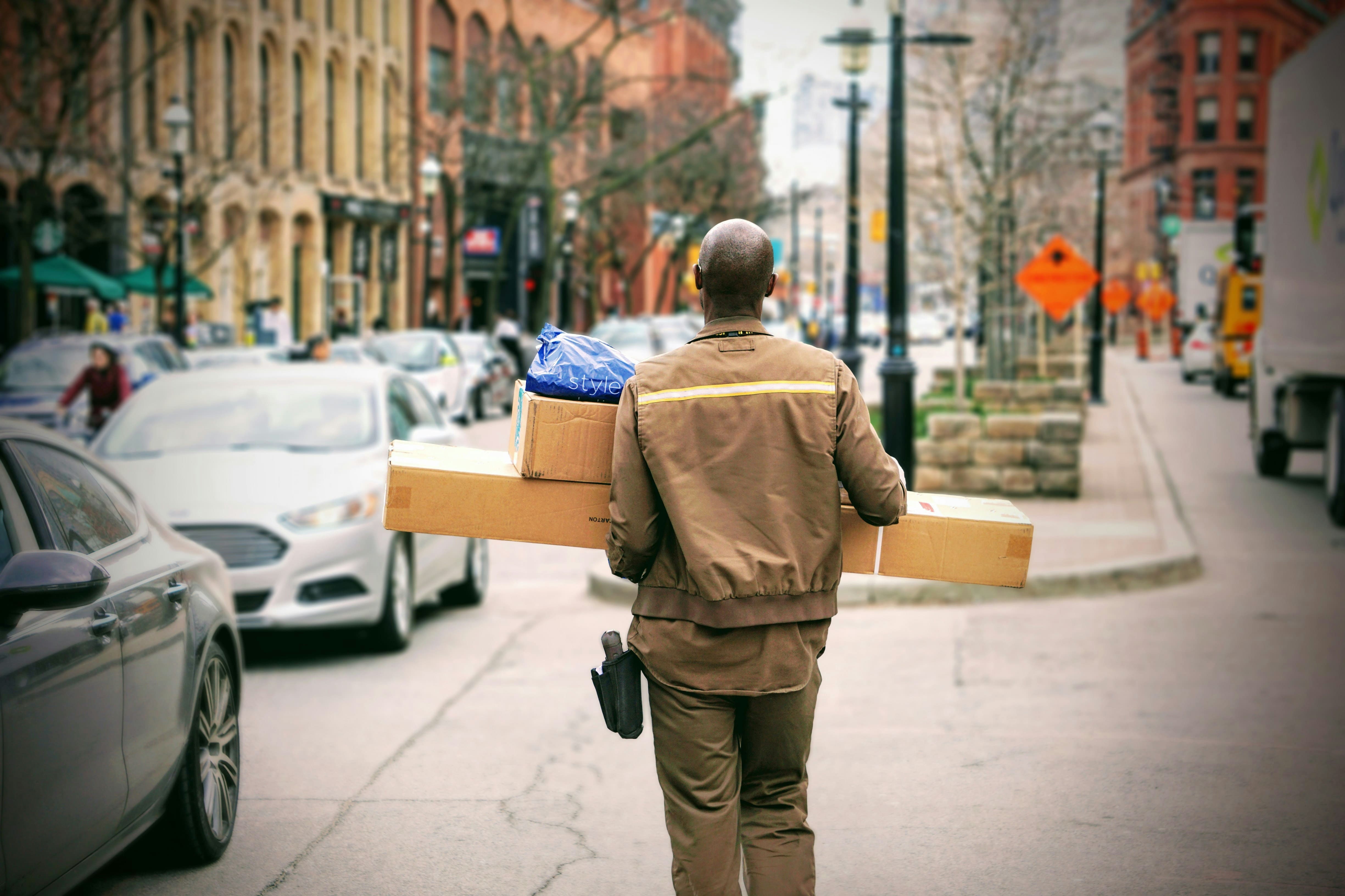 man delivering goods for Corporate Gifts Suppliers