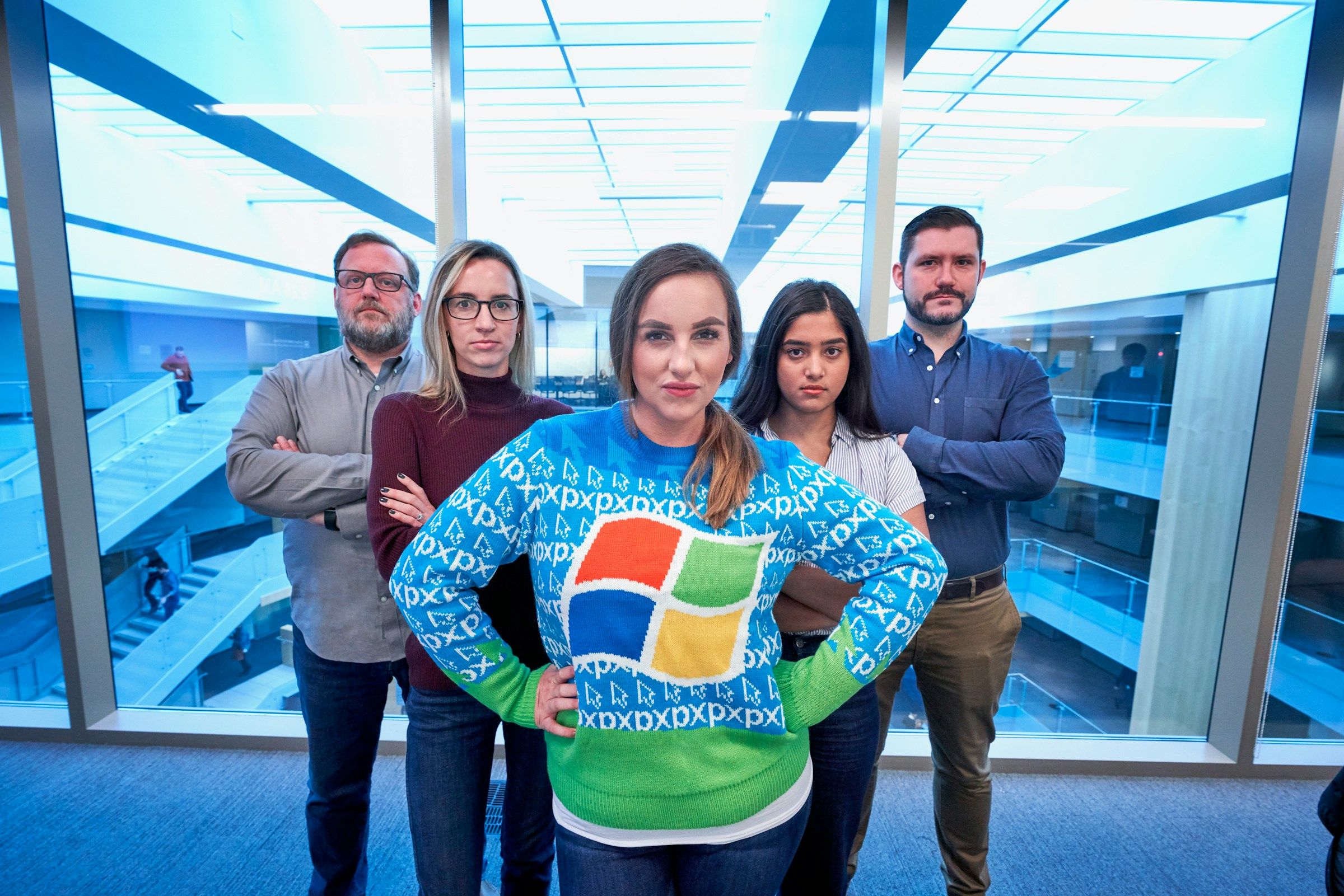 new hire in new shirt - new hire welcome kit