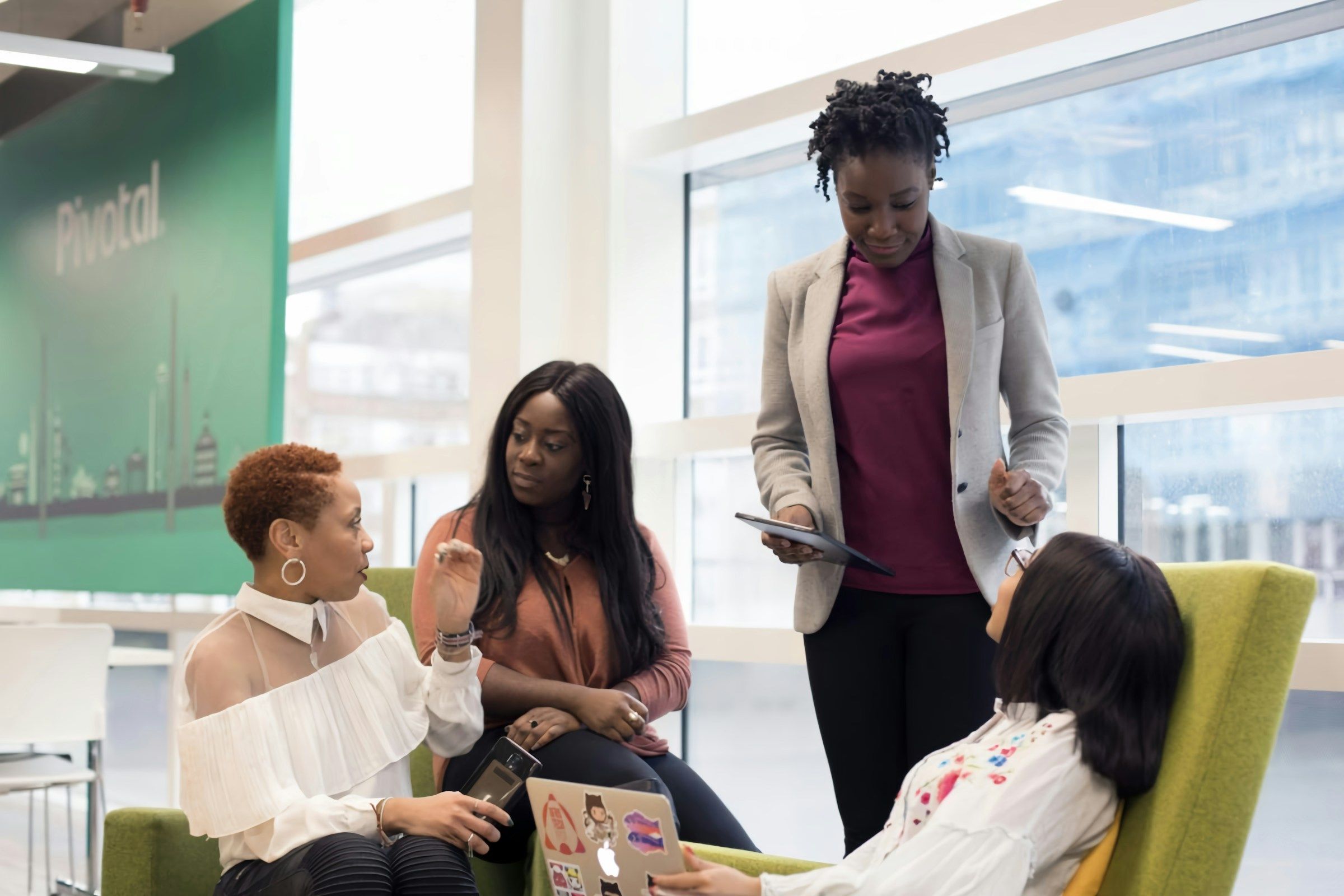 woman in a meeting - Employee Appreciation Day Ideas for Large Companies