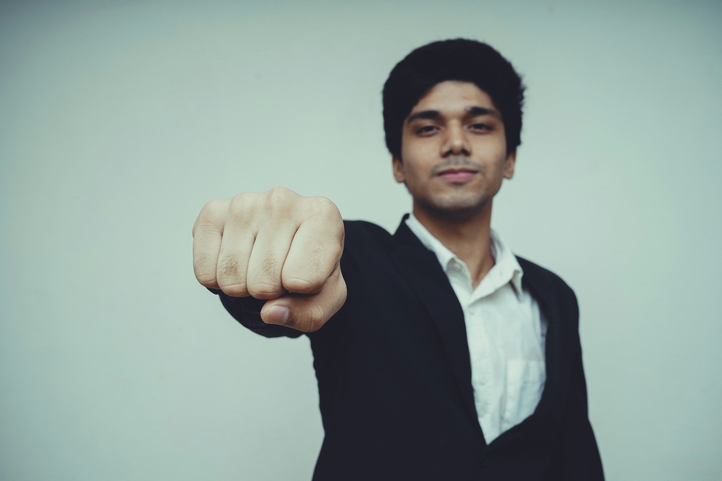 man giving a fist bump - Best Career Fair Swag